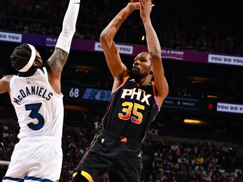 PHOENIX, AZ - APRIL 4: Kevin Durant #35 of the Phoenix Suns shoots the ball during the game against the Minnesota Timberwolves during Round 1 Game 4 of the 2024 NBA Playoffs on April 4, 2023 at Footprint Center in Phoenix, Arizona. NOTE TO USER: User expressly acknowledges and agrees that, by downloading and or using this photograph, user is consenting to the terms and conditions of the Getty Images License Agreement. Mandatory Copyright Notice: Copyright 2024 NBAE (Photo by Barry Gossage/NBAE via Getty Images)