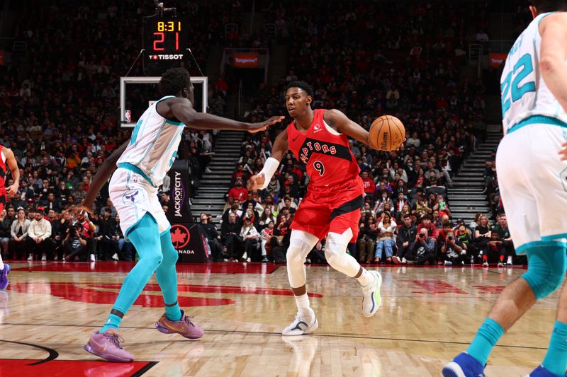 TORONTO, CANADA - MARCH 3: RJ Barrett #9 of the Toronto Raptors drives to the basket during the game against the Charlotte Hornets on March 3, 2024 at the Scotiabank Arena in Toronto, Ontario, Canada.  NOTE TO USER: User expressly acknowledges and agrees that, by downloading and or using this Photograph, user is consenting to the terms and conditions of the Getty Images License Agreement.  Mandatory Copyright Notice: Copyright 2024 NBAE (Photo by Vaughn Ridley/NBAE via Getty Images)