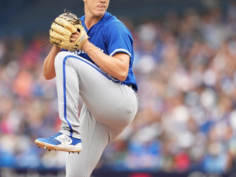 Sep 9, 2023; Toronto, Ontario, CAN; Kansas City Royals starting pitcher James McArthur (66) pitches against the Toronto Blue Jays during the first inning at Rogers Centre. Mandatory Credit: Nick Turchiaro-USA TODAY Sports