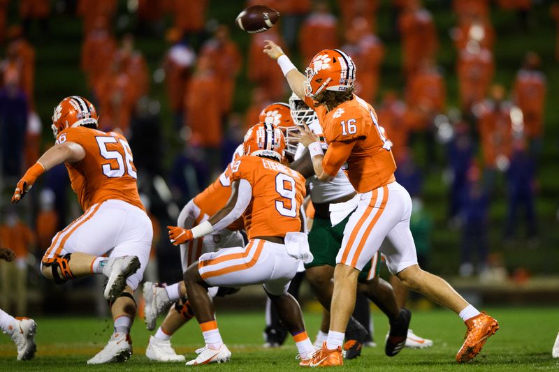 Oct 10, 2020; Clemson, South Carolina, USA; Clemson Tigers quarterback Trevor Lawrence (16) throws the ball against the Miami Hurricanes during the first quarter at Memorial Stadium. Mandatory Credit: Ken Ruinard-USA TODAY Sports