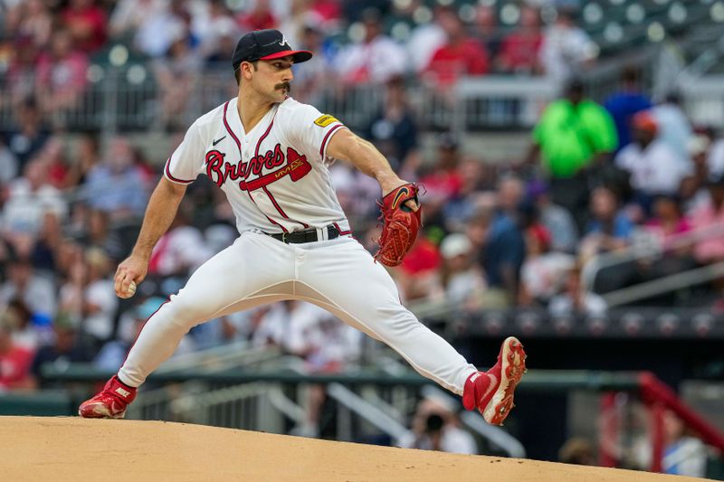 Sep 6, 2023; Cumberland, Georgia, USA; Atlanta Braves starting pitcher Spencer Strider (99) pitches against the St. Louis Cardinals during the first inning at Truist Park. Mandatory Credit: Dale Zanine-USA TODAY Sports