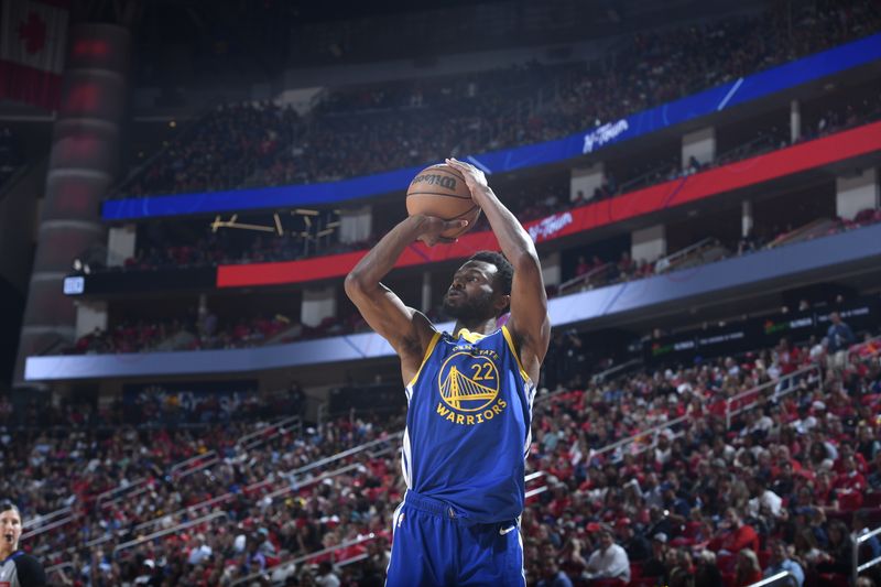 HOUSTON, TX - APRIL 4: Andrew Wiggins #22 of the Golden State Warriors shoots a three point basket during the game against the Houston Rockets on April 4, 2024 at the Toyota Center in Houston, Texas. NOTE TO USER: User expressly acknowledges and agrees that, by downloading and or using this photograph, User is consenting to the terms and conditions of the Getty Images License Agreement. Mandatory Copyright Notice: Copyright 2024 NBAE (Photo by Logan Riely/NBAE via Getty Images)