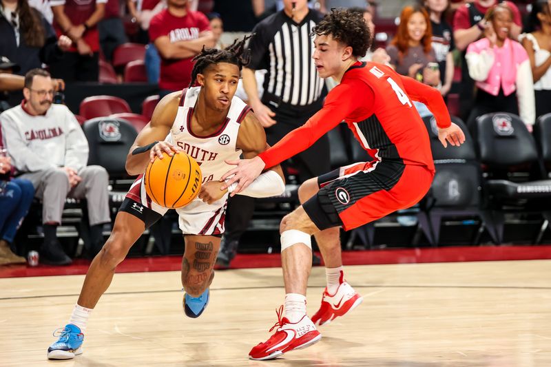 Mar 4, 2023; Columbia, South Carolina, USA; South Carolina Gamecocks guard Meechie Johnson (5) drives around Georgia Bulldogs guard Jusaun Holt (4) in the second half at Colonial Life Arena. Mandatory Credit: Jeff Blake-USA TODAY Sports