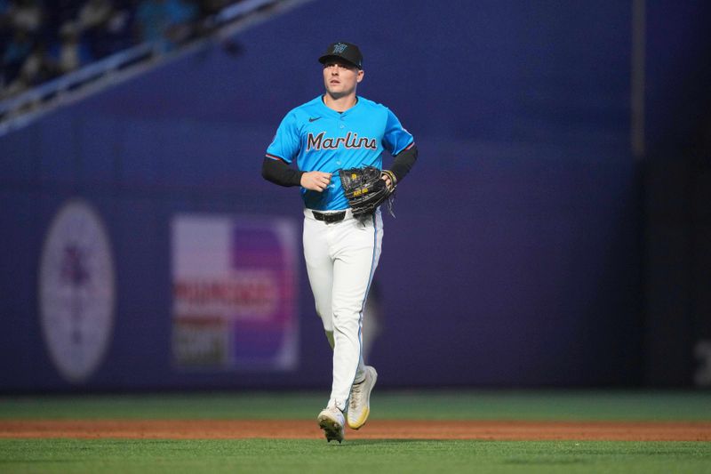 Aug 25, 2024; Miami, Florida, USA;  Miami Marlins pitcher Calvin Faucher (53) enters the game in the ninth inning against the Chicago Cubs at loanDepot Park. Mandatory Credit: Jim Rassol-USA TODAY Sports