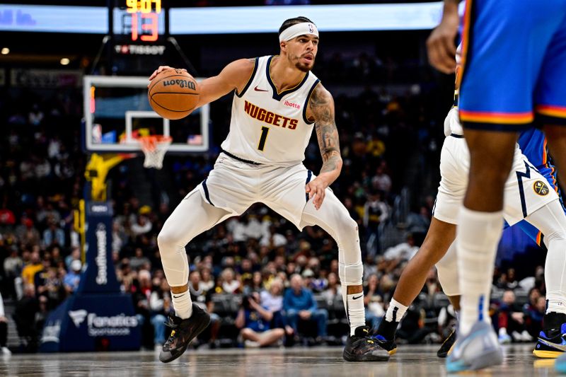 DENVER, COLORADO - OCTOBER 25: Michael Porter Jr. #1 of the Denver Nuggets dribbles the ball against the Oklahoma City Thunder in the second half at Ball Arena on October 15, 2024 in Denver, Colorado. NOTE TO USER: User expressly acknowledges and agrees that, by downloading and or using this photograph, User is consenting to the terms and conditions of the Getty Images License Agreement. (Photo by Dustin Bradford/Getty Images)