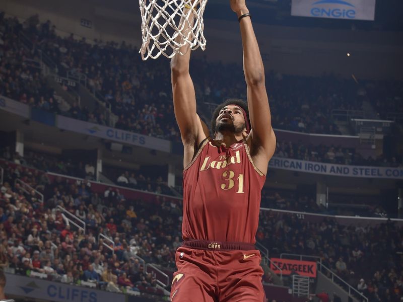 CLEVELAND, OH - MARCH 10: Jarrett Allen #31 of the Cleveland Cavaliers dunks the ball during the game against the Brooklyn Nets on March 10, 2024 at Rocket Mortgage FieldHouse in Cleveland, Ohio. NOTE TO USER: User expressly acknowledges and agrees that, by downloading and/or using this Photograph, user is consenting to the terms and conditions of the Getty Images License Agreement. Mandatory Copyright Notice: Copyright 2024 NBAE (Photo by David Liam Kyle/NBAE via Getty Images)