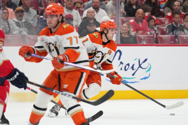 Oct 28, 2025; Sunrise, Florida, USA; Anaheim Ducks center Leo Carlsson (91) brings the puck up the ice against the Florida Panthers during the first period at Amerant Bank Arena. Mandatory Credit: Jim Rassol-Imagn Images