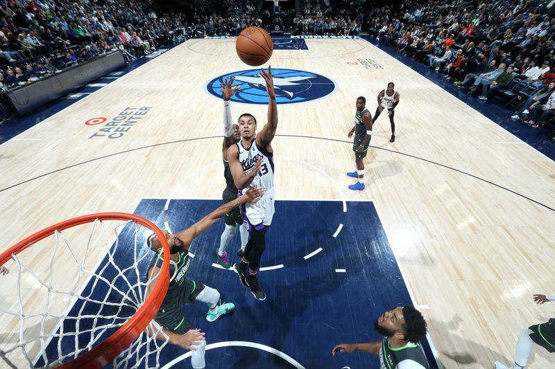 MINNEAPOLIS, MN -  MARCH 1: Keegan Murray #13 of the Sacramento Kings shoots the ball during the game against the Minnesota Timberwolves on March 1, 2024 at Target Center in Minneapolis, Minnesota. NOTE TO USER: User expressly acknowledges and agrees that, by downloading and or using this Photograph, user is consenting to the terms and conditions of the Getty Images License Agreement. Mandatory Copyright Notice: Copyright 2024 NBAE (Photo by David Sherman/NBAE via Getty Images)