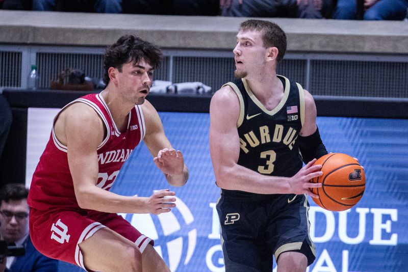 Feb 10, 2024; West Lafayette, Indiana, USA; Purdue Boilermakers guard Braden Smith (3) dribbles the ball while Indiana Hoosiers guard Trey Galloway (32) defends in the first half at Mackey Arena. Mandatory Credit: Trevor Ruszkowski-USA TODAY Sports