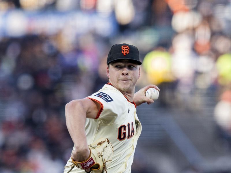 Jun 10, 2024; San Francisco, California, USA; San Francisco Giants starting pitcher Kyle Harrison (45) throws against the Houston Astros during the first inning at Oracle Park. Mandatory Credit: John Hefti-USA TODAY Sports1