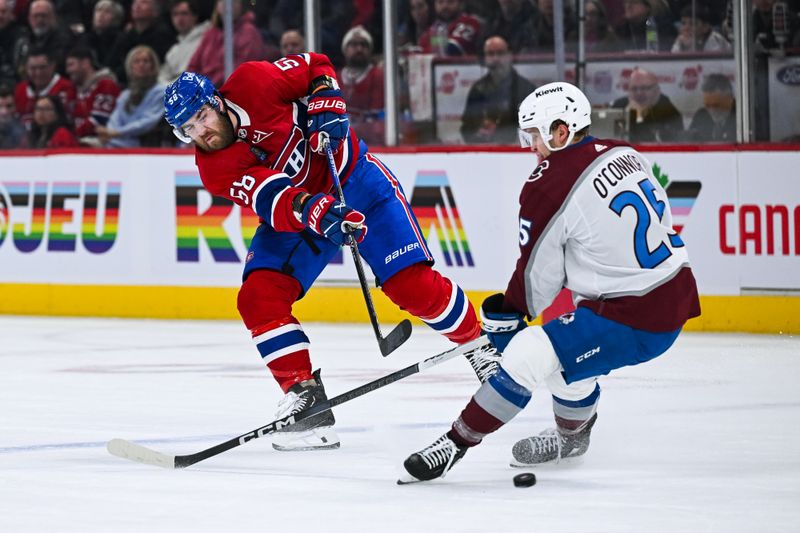 Jan 15, 2024; Montreal, Quebec, CAN; Montreal Canadiens defenseman David Savard (58) shoots the puck beside Colorado Avalanche right wing Logan O'Connor (25) during the third period at Bell Centre. Mandatory Credit: David Kirouac-USA TODAY Sports