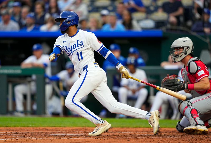 May 28, 2025; Kansas City, Missouri, USA; Kansas City Royals designated hitter Maikel Garcia (11) hits a single during the fourth inning against the Cincinnati Reds at Kauffman Stadium. Mandatory Credit: Jay Biggerstaff-Imagn Images
