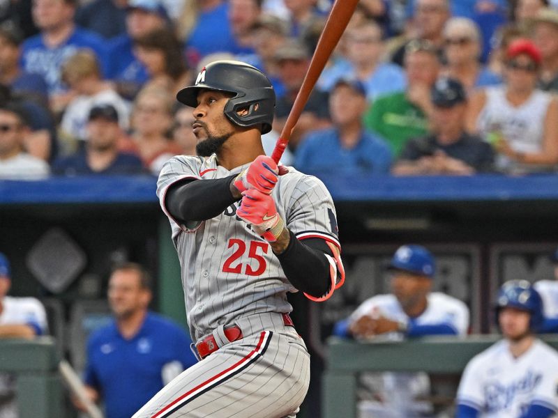 Jul 29, 2023; Kansas City, Missouri, USA;  Minnesota Twins designated hitter Byron Buxton (25) doubles during the sixth inning against the Kansas City Royals at Kauffman Stadium. Mandatory Credit: Peter Aiken-USA TODAY Sports