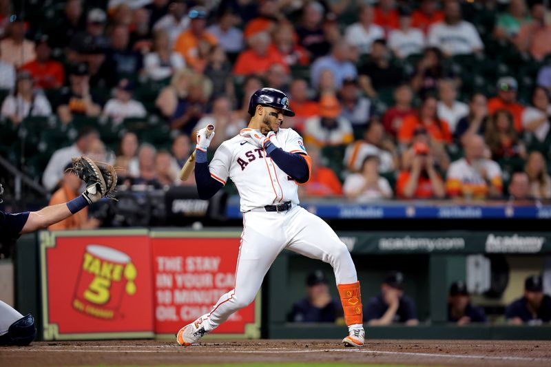 Sep 25, 2024; Houston, Texas, USA; Houston Astros shortstop Jeremy Pena (3) is hit by a pitch from Seattle Mariners pitcher George Kirby (68, not shown) during the first inning at Minute Maid Park. Mandatory Credit: Erik Williams-Imagn Images