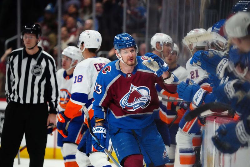 Jan 2, 2024; Denver, Colorado, USA; Colorado Avalanche right wing Valeri Nichushkin (13) celebrates his goal in the third period against the New York Islanders at Ball Arena. Mandatory Credit: Ron Chenoy-USA TODAY Sports