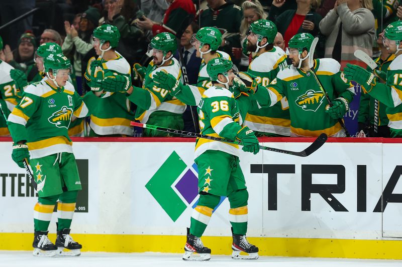 Dec 3, 2023; Saint Paul, Minnesota, USA; Minnesota Wild right wing Mats Zuccarello (36) is congratulated for his goal against the Chicago Blackhawks during the first period at Xcel Energy Center. Mandatory Credit: Matt Krohn-USA TODAY Sports