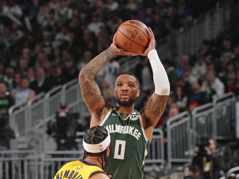 MILWAUKEE, WI - APRIL 21: Damian Lillard #0 of the Milwaukee Bucks looks to pass the ball during the game against the Indiana Pacers during Round 1 Game 1 of the 2024 NBA Playoffs on April 21, 2024 at the Fiserv Forum Center in Milwaukee, Wisconsin. NOTE TO USER: User expressly acknowledges and agrees that, by downloading and or using this Photograph, user is consenting to the terms and conditions of the Getty Images License Agreement. Mandatory Copyright Notice: Copyright 2024 NBAE (Photo by Gary Dineen/NBAE via Getty Images).