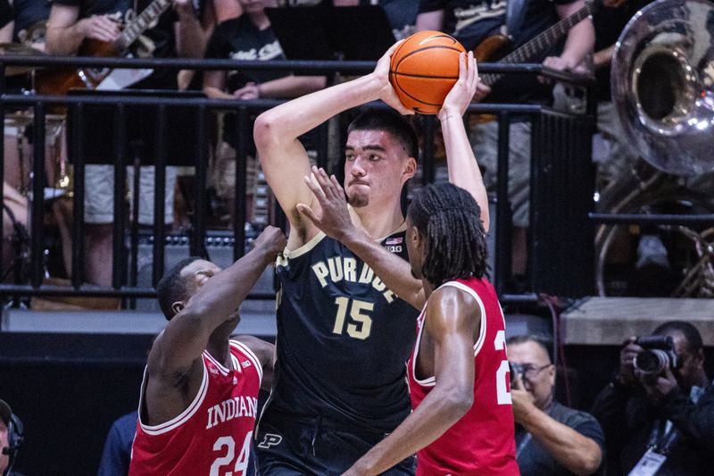 Feb 10, 2024; West Lafayette, Indiana, USA; Purdue Boilermakers center Zach Edey (15) looks to pass the ball while Indiana Hoosiers forward Payton Sparks (24) defends in the first half at Mackey Arena. Mandatory Credit: Trevor Ruszkowski-USA TODAY Sports