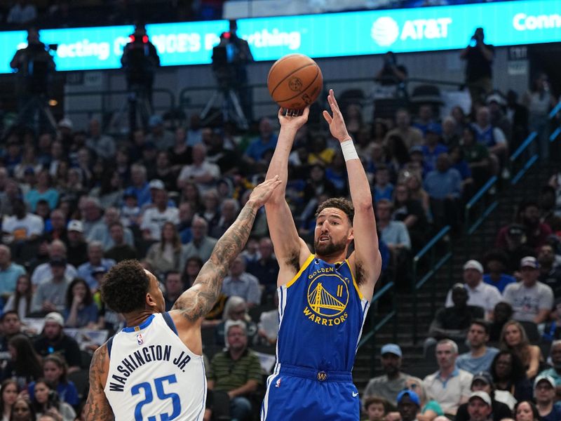 DALLAS, TX - MARCH 13: Klay Thompson #11 of the Golden State Warriors shoots the ball during the game against the Dallas Mavericks on March 13, 2024 at the American Airlines Center in Dallas, Texas. NOTE TO USER: User expressly acknowledges and agrees that, by downloading and or using this photograph, User is consenting to the terms and conditions of the Getty Images License Agreement. Mandatory Copyright Notice: Copyright 2024 NBAE (Photo by Glenn James/NBAE via Getty Images)