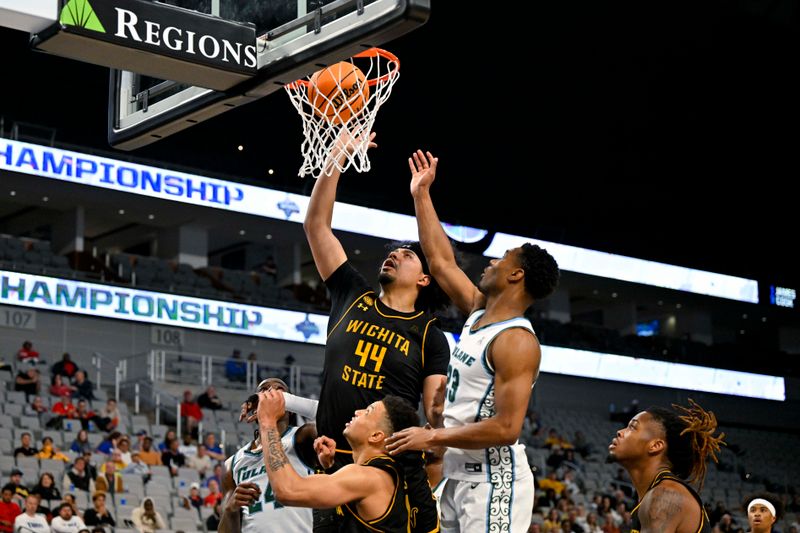 Mar 10, 2023; Fort Worth, TX, USA; Wichita State Shockers forward Isaiah Poor Bear-Chandler (44) tips in a rebound against the Tulane Green Wave during the first half at Dickies Arena. Mandatory Credit: Jerome Miron-USA TODAY Sports