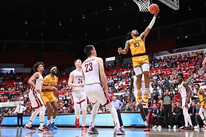 Jan 28, 2023; Pullman, Washington, USA; Arizona State Sun Devils guard Frankie Collins (10) shoots the ball against Washington State Cougars forward Andrej Jakimovski (23) in the first half at Friel Court at Beasley Coliseum. Mandatory Credit: James Snook-USA TODAY Sports