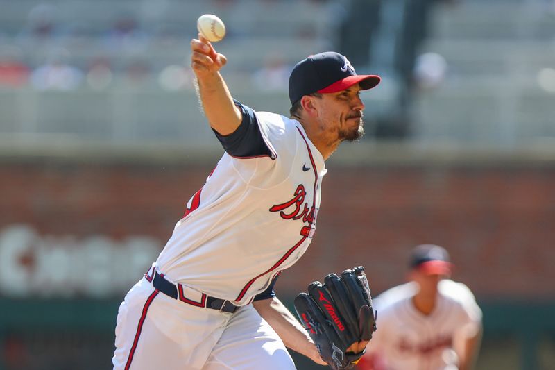 Sep 28, 2025; Cumberland, Georgia, USA; Atlanta Braves pitcher Charlie Morton (50) pitches the ball against the Pittsburgh Pirates during the second inning at Truist Park. Mandatory Credit: Jordan Godfree-Imagn Images