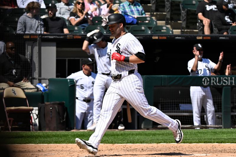 May 15, 2024; Chicago, Illinois, USA;  Chicago White Sox outfielder Andrew Benintendi (23) scores against the Washington Nationals during the sixth inning at Guaranteed Rate Field. Mandatory Credit: Matt Marton-USA TODAY Sports