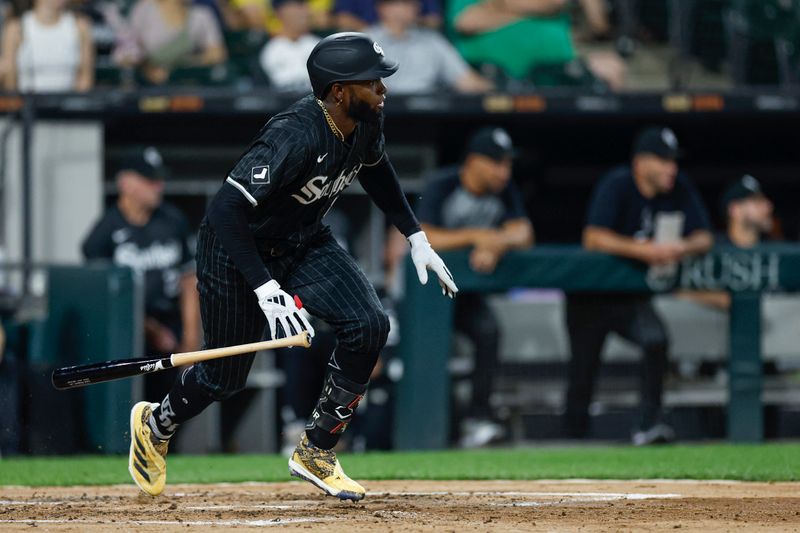 Aug 26, 2024; Chicago, Illinois, USA; Chicago White Sox outfielder Luis Robert Jr. (88) grounds into a force out against the Detroit Tigers during the third inning at Guaranteed Rate Field. Mandatory Credit: Kamil Krzaczynski-USA TODAY Sports