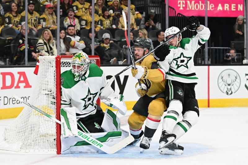 Apr 27, 2024; Las Vegas, Nevada, USA; Vegas Golden Knights center Tomas Hertl (48) collides with Dallas Stars center Wyatt Johnston (53) in front of goaltender Jake Oettinger (29) in the first period in game three of the first round of the 2024 Stanley Cup Playoffs at T-Mobile Arena. Mandatory Credit: Candice Ward-USA TODAY Sports