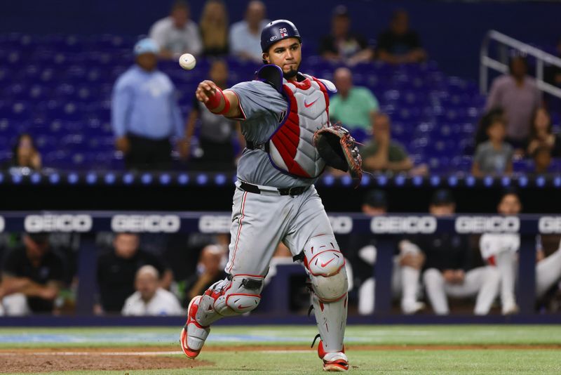 Sep 4, 2024; Miami, Florida, USA; Washington Nationals catcher Keibert Ruiz (20) throws to first base to retire Miami Marlins second baseman Otto Lopez (not pictured) during the ninth inning at loanDepot Park. Mandatory Credit: Sam Navarro-Imagn Images