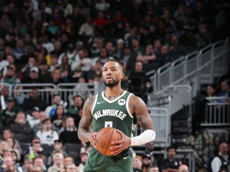 MILWAUKEE, WI - NOVEMBER 18: Damian Lillard #0 of the Milwaukee Bucks looks to pass the ball during the game against the Houston Rockets on November 18, 2024 at the Fiserv Forum Center in Milwaukee, Wisconsin. NOTE TO USER: User expressly acknowledges and agrees that, by downloading and or using this Photograph, user is consenting to the terms and conditions of the Getty Images License Agreement. Mandatory Copyright Notice: Copyright 2024 NBAE (Photo by Gary Dineen/NBAE via Getty Images).