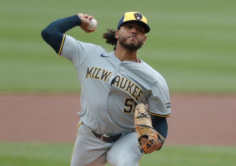 Apr 25, 2024; Pittsburgh, Pennsylvania, USA;  Milwaukee Brewers starting pitcher Freddy Peralta (51) delivers a pitch against the Pittsburgh Pirates during the first inning at PNC Park. Mandatory Credit: Charles LeClaire-USA TODAY Sports