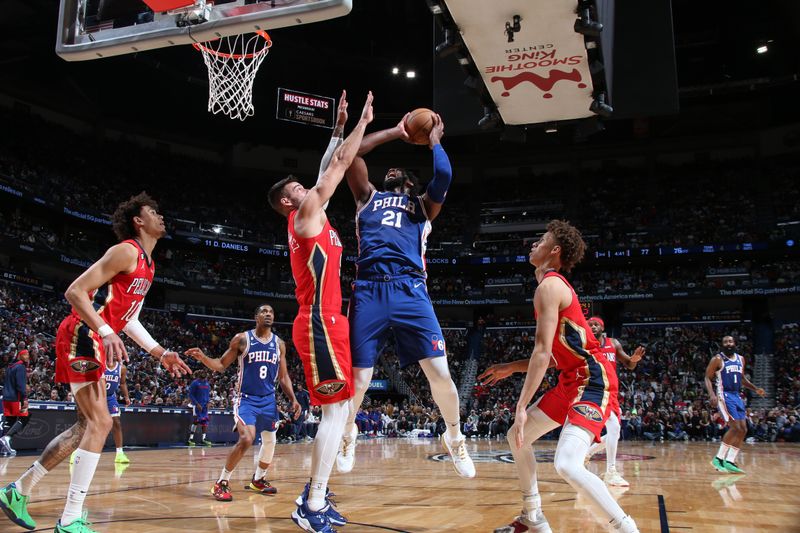 NEW ORLEANS, LA - DECEMBER 30: Joel Embiid #21 of the Philadelphia 76ers drives to the basket during the game against the New Orleans Pelicans on December 30, 2022 at the Smoothie King Center in New Orleans, Louisiana. NOTE TO USER: User expressly acknowledges and agrees that, by downloading and or using this Photograph, user is consenting to the terms and conditions of the Getty Images License Agreement. Mandatory Copyright Notice: Copyright 2022 NBAE (Photo by Layne Murdoch Jr./NBAE via Getty Images)