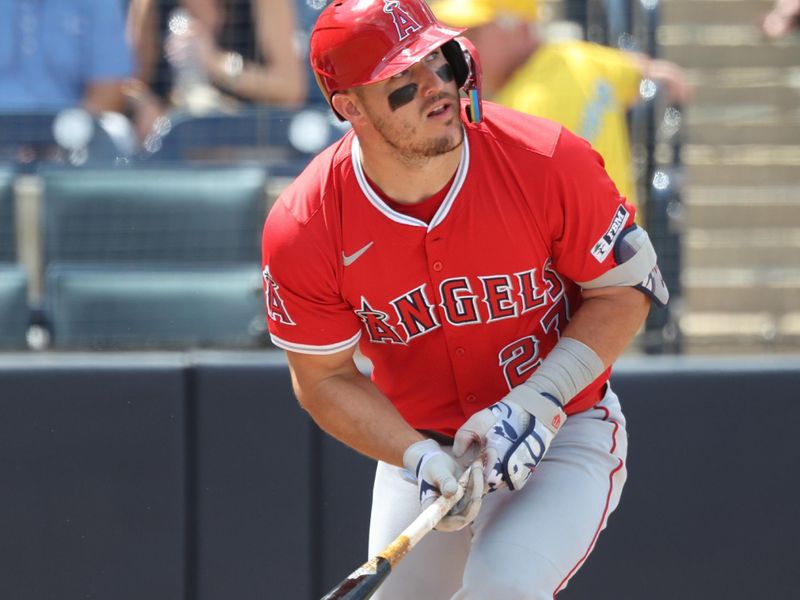 Apr 10, 2025; Tampa, Fl, USA; Los Angeles Angels designated hitter Mike Trout (27) hits a home run during the ninth inning against the Tampa Bay Rays at George M. Steinbrenner Field. Mandatory Credit: Kim Klement Neitzel-Imagn Images
