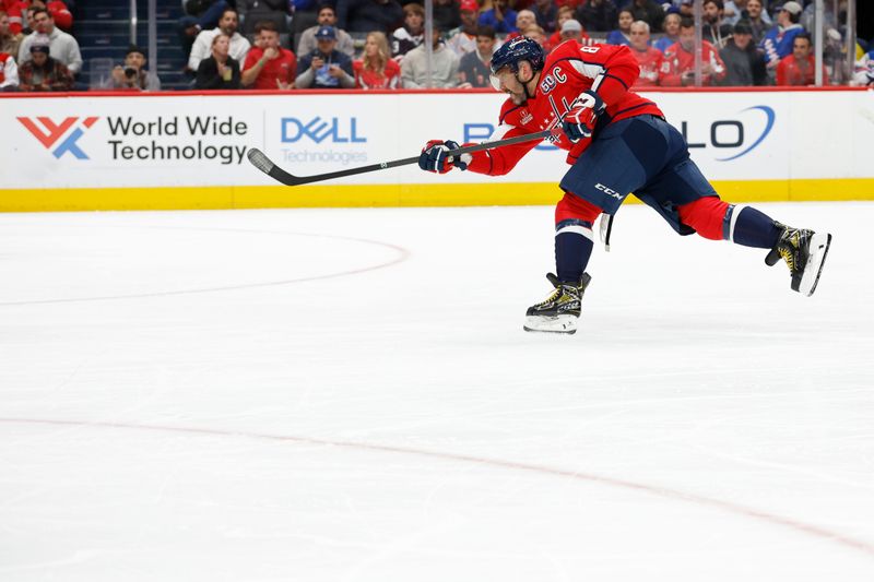 Oct 29, 2024; Washington, District of Columbia, USA; Washington Capitals left wing Alex Ovechkin (8) shoots the puck against the New York Rangers in the first period at Capital One Arena. Mandatory Credit: Geoff Burke-Imagn Images