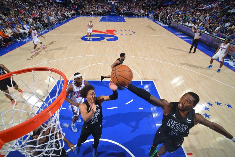 PHILADELPHIA, PA - APRIL 14: Lonnie Walker IV #8 of the Brooklyn Nets rebounds the ball during the game against the Philadelphia 76ers on April 14, 2024 at the Wells Fargo Center in Philadelphia, Pennsylvania NOTE TO USER: User expressly acknowledges and agrees that, by downloading and/or using this Photograph, user is consenting to the terms and conditions of the Getty Images License Agreement. Mandatory Copyright Notice: Copyright 2024 NBAE (Photo by Jesse D. Garrabrant/NBAE via Getty Images)