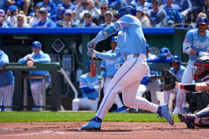 Apr 10, 2025; Kansas City, Missouri, USA; Kansas City Royals shortstop Bobby Witt Jr. (7) connects for a single against the Minnesota Twins  at Kauffman Stadium. Mandatory Credit: Denny Medley-Imagn Images
