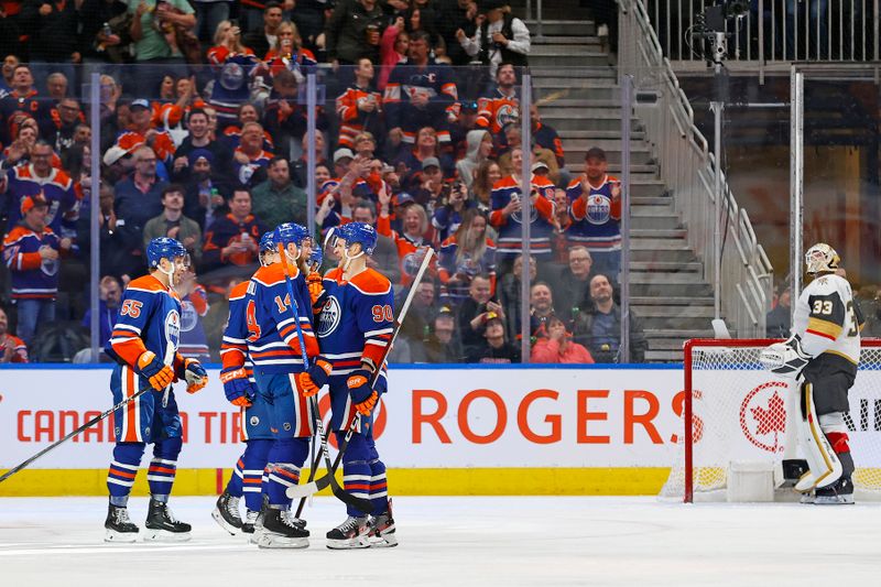 Apr 10, 2024; Edmonton, Alberta, CAN; The Edmonton Oilers celebrate a goal scored by defensemen Mattias Ekholm (14) during the second period against the Vegas Golden Knights at Rogers Place. Mandatory Credit: Perry Nelson-USA TODAY Sports