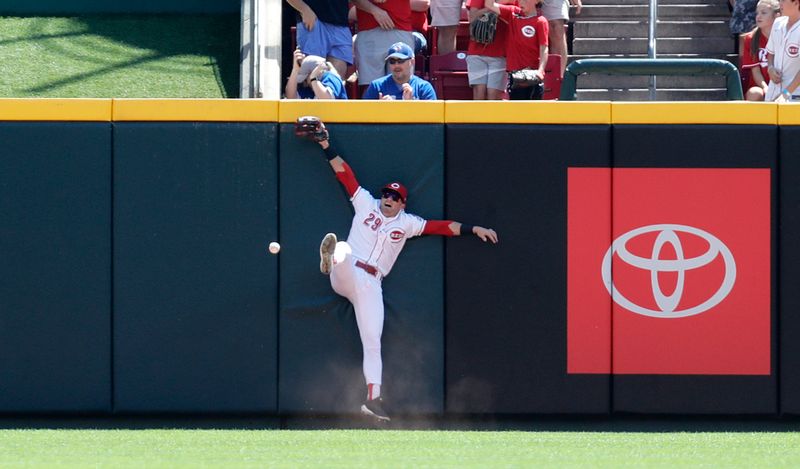 Aug 20, 2023; Cincinnati, Ohio, USA; Cincinnati Reds center fielder TJ Friedl (29) fails to field a triple from Toronto Blue Jays shortstop Bo Bichette (not pictured) during the first inning at Great American Ball Park. Mandatory Credit: David Kohl-USA TODAY Sports