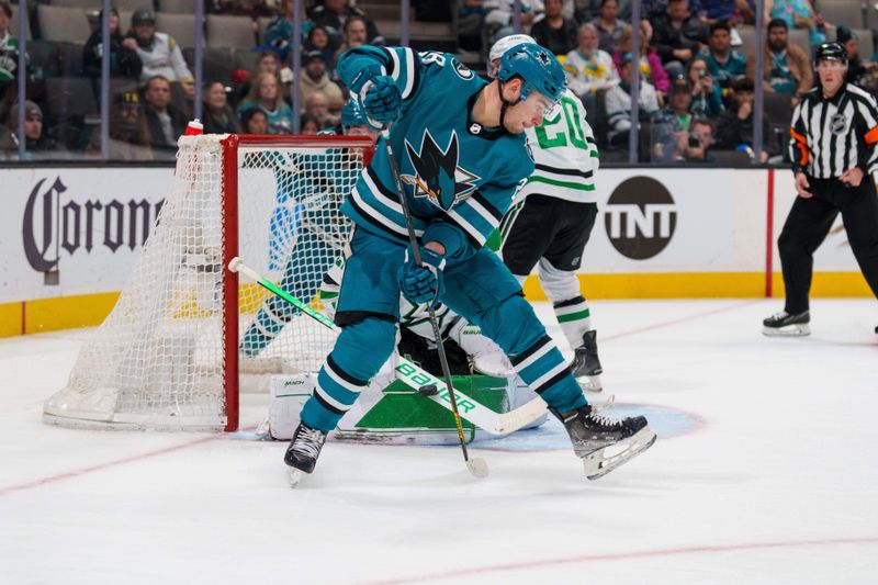 Jan 18, 2023; San Jose, California, USA; Dallas Stars goaltender Jake Oettinger (29) makes a save against San Jose Sharks right wing Timo Meier (28) during the second period at SAP Center at San Jose. Mandatory Credit: Neville E. Guard-USA TODAY Sports