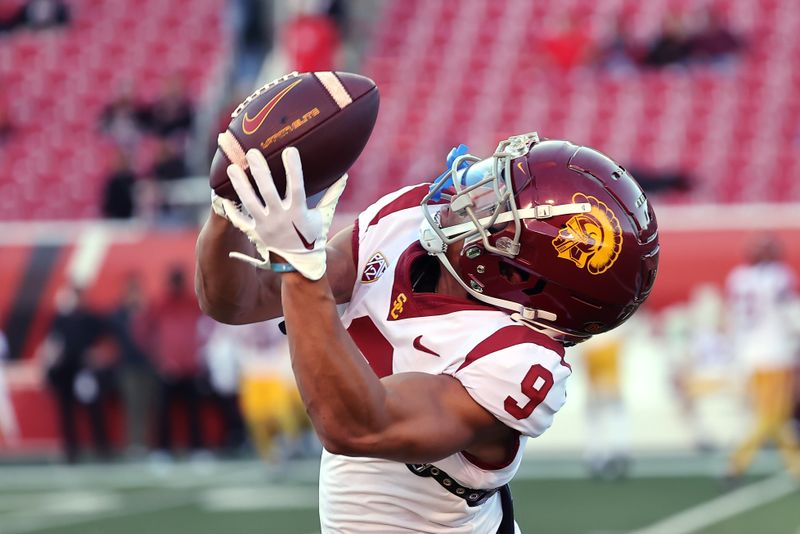 Oct 15, 2022; Salt Lake City, Utah, USA; USC Trojans wide receiver Michael Jackson III (9) warms up prior to a game against the Utah Utes at Rice-Eccles Stadium. Mandatory Credit: Rob Gray-USA TODAY Sports