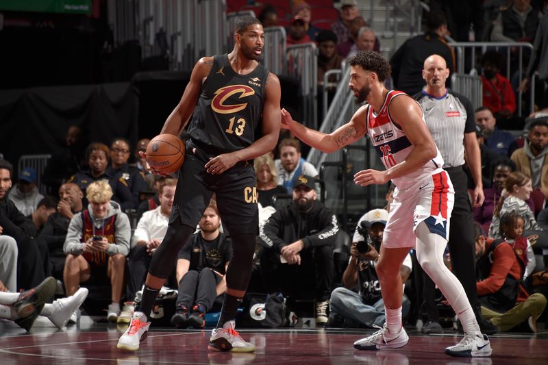 CLEVELAND, OH - NOVEMBER 03: Tristan Thompson #13 of the Cleveland Cavaliers handles the ball during the game against the Washington Wizards during the Emirates NBA Cup game on November 03, 2024 at Rocket Mortgage FieldHouse in Cleveland, Ohio. NOTE TO USER: User expressly acknowledges and agrees that, by downloading and/or using this Photograph, user is consenting to the terms and conditions of the Getty Images License Agreement. Mandatory Copyright Notice: Copyright 2024 NBAE (Photo by David Liam Kyle/NBAE via Getty Images)