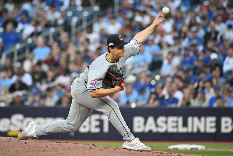 Jun 14, 2024; Toronto, Ontario, CAN;  Cleveland Indians starting pitcher Logan Allen (41) delivers a pitch against the Toronto Blue Jays in the second inning at Rogers Centre. Mandatory Credit: Dan Hamilton-USA TODAY Sports