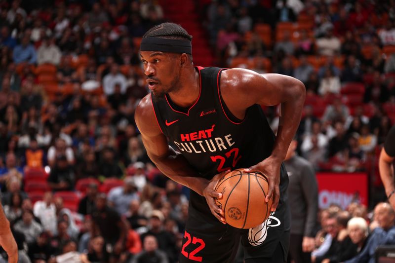 MIAMI, FL - JANUARY 29: Jimmy Butler #22 of the Miami Heat handles the ball during the game against the Phoenix Suns on January 29, 2024 at Kaseya Center in Miami, Florida. NOTE TO USER: User expressly acknowledges and agrees that, by downloading and or using this Photograph, user is consenting to the terms and conditions of the Getty Images License Agreement. Mandatory Copyright Notice: Copyright 2024 NBAE (Photo by Issac Baldizon/NBAE via Getty Images)