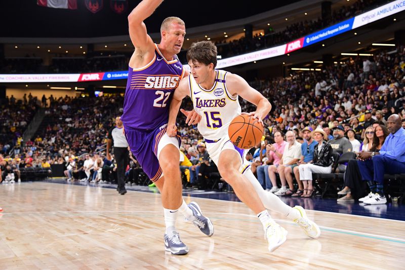 LOS ANGELES, CA - OCTOBER 6: Austin Reaves #15 of the Los Angeles Lakers drives to the basket during the game against the Phoenix Suns on October 6, 2024 at Acrisure Arena in Palm Springs, California. NOTE TO USER: User expressly acknowledges and agrees that, by downloading and/or using this Photograph, user is consenting to the terms and conditions of the Getty Images License Agreement. Mandatory Copyright Notice: Copyright 2024 NBAE (Photo by Adam Pantozzi/NBAE via Getty Images)