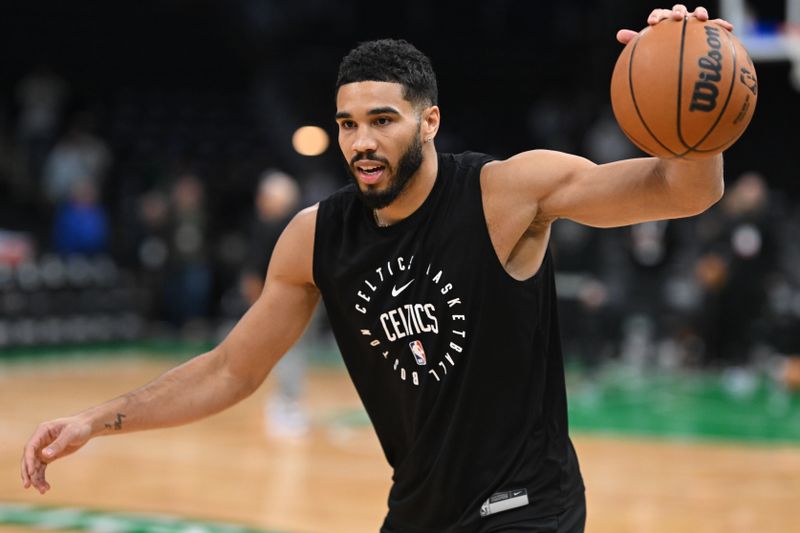 BOSTON, MASSACHUSETTS - OCTOBER 28: Jayson Tatum #0 of the Boston Celtics dribbles the ball before a game against the Milwaukee Bucks at the TD Garden on October 28, 2024 in Boston, Massachusetts. NOTE TO USER: User expressly acknowledges and agrees that, by downloading and or using this photograph, User is consenting to the terms and conditions of the Getty Images License Agreement. (Photo by Brian Fluharty/Getty Images)