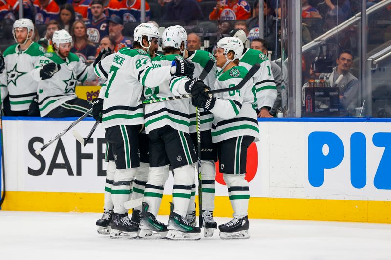May 27, 2025; Edmonton, Alberta, CAN; Dallas Stars left wing Mason Marchment (27) and center Mikael Granlund (64) and left wing Jason Robertson (21) and center Tyler Seguin (91) celebrates a goal scored by Robertson against the Edmonton Oilers during the second period in game four of the Western Conference Final of the 2025 Stanley Cup Playoffs at Rogers Place. Mandatory Credit: Perry Nelson-Imagn Images