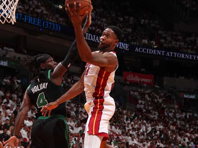 MIAMI, FL - APRIL 27: Haywood Highsmith #24 of the Miami Heat drives to the basket during the game against the Boston Celtics during Round 1 Game 3 of the 2024 NBA Playoffs on April 27, 2024 at Kaseya Center in Miami, Florida. NOTE TO USER: User expressly acknowledges and agrees that, by downloading and or using this Photograph, user is consenting to the terms and conditions of the Getty Images License Agreement. Mandatory Copyright Notice: Copyright 2024 NBAE (Photo by Issac Baldizon/NBAE via Getty Images)