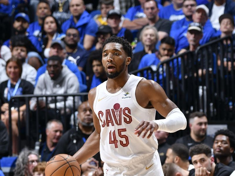 ORLANDO, FL - APRIL 25: Donovan Mitchell #45 of the Cleveland Cavaliers handles the ball during the game  against the Orlando Magic during Round 1 Game 3 of the 2024 NBA Playoffs on April 25, 2024 at Kia Center in Orlando, Florida. NOTE TO USER: User expressly acknowledges and agrees that, by downloading and or using this photograph, User is consenting to the terms and conditions of the Getty Images License Agreement. Mandatory Copyright Notice: Copyright 2023 NBAE (Photo by Fernando Medina/NBAE via Getty Images)