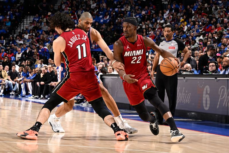 PHILADELPHIA, PA - APRIL 17:  Jimmy Butler #22 of the Miami Heat handles the ball during the game again the Philadelphia 76ers during the 2024 NBA Play-In Tournament on April 17, 2024 at the Wells Fargo Center in Philadelphia, Pennsylvania NOTE TO USER: User expressly acknowledges and agrees that, by downloading and/or using this Photograph, user is consenting to the terms and conditions of the Getty Images License Agreement. Mandatory Copyright Notice: Copyright 2024 NBAE (Photo by David Dow/NBAE via Getty Images)